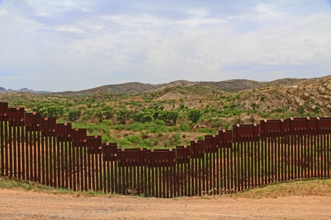 Border Fence Separating the US from Mexico Near Nogales, Arizona. Image copyright: Linda Johnsonbaugh